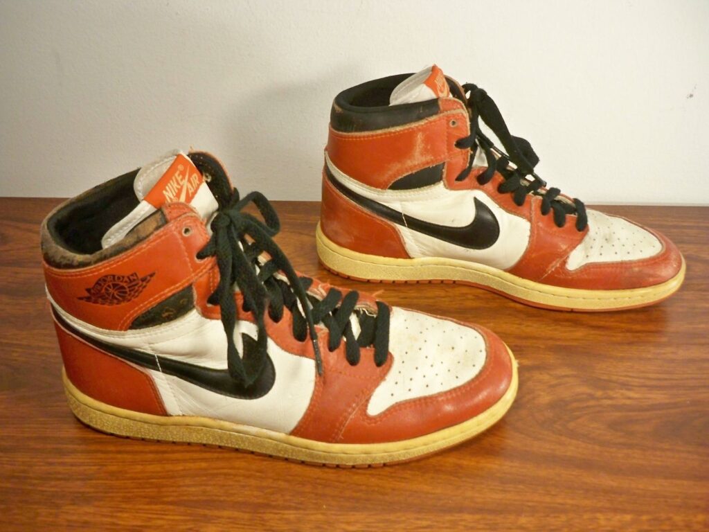 Vintage Air Jordan 1 from 1985 displayed against a neutral background, showing original design details and colorway