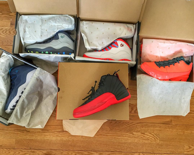 Rare sneakers displayed on a clean white shelf in box-fresh condition